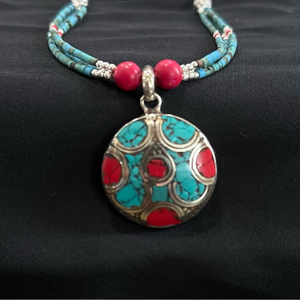 Handcrafted torquise, young amber, coral necklace. 
Handcrafted in Nepal